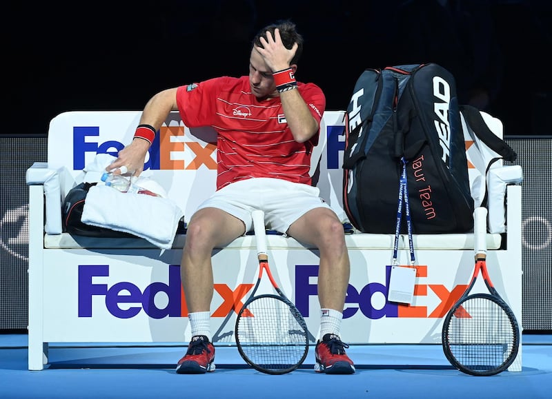 Diego Schwartzman ofduring a break between games in his group stage match against Novak Djokovic. EPA