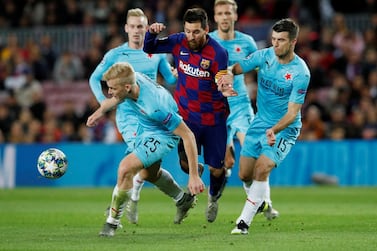 Barcelona's Lionel Messi finds it tough going in the Champions League draw against Slavia Prague at the Camp Nou. Reuters