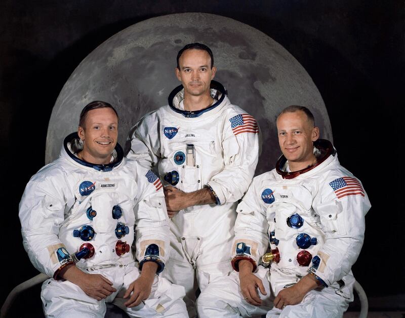 The Apollo 11 lunar landing mission crew with, from left, mission commander Neil A. Armstrong, command module pilot Michael Collins and lunar module pilot Edwin E. Aldrin Jr. pose in their space suits. NASA / EPA