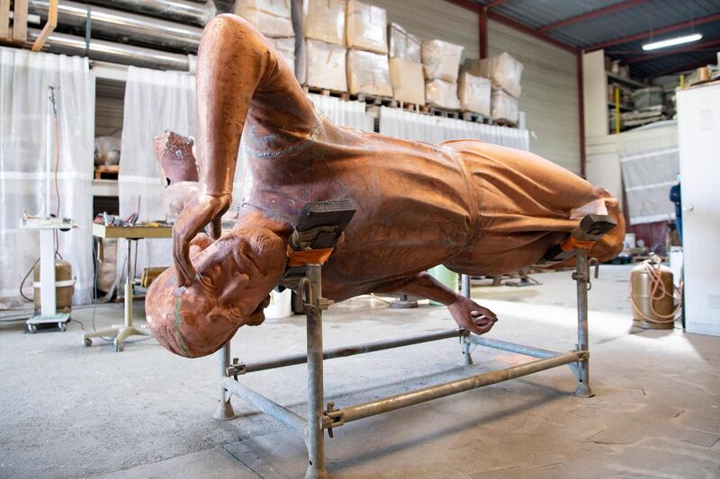 A bronze statue of Saint Thomas, from the Cathedral Notre-Dame in Paris, being restored at a workshop in Marsac sur L'Isle, near Bordeaux, France. EPA