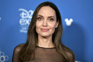 Angelina Jolie attends the "Go Behind the Scenes with the Walt Disney Studios," press line at the 2019 D23 Expo, Saturday, Aug. 24, 2019, in Anaheim, Calif. (Photo by Richard Shotwell/Invision/AP)