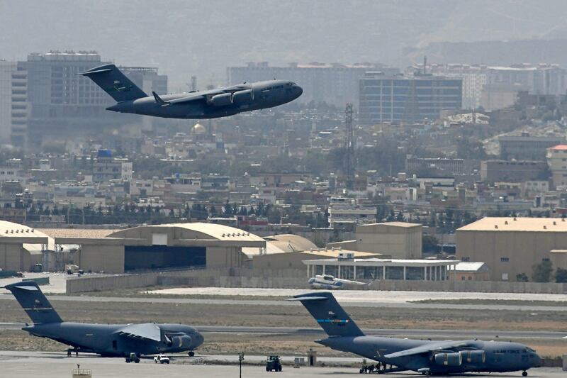 An US Air Force aircraft takes off from the airport in Kabul on August 30, 2021. AFP