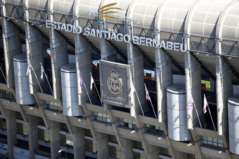 Real Madrid and Barcelona earn about 10 times the TV revenue of their peer clubs in Spain, annually. Gerard Julien / AFP