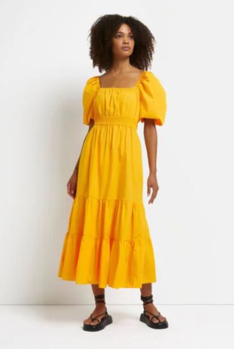 The bright colour and puffed sleeves make this River Island midi dress perfect for summer weddings; Dh207, River Island at next.ae. Photo: River Island
