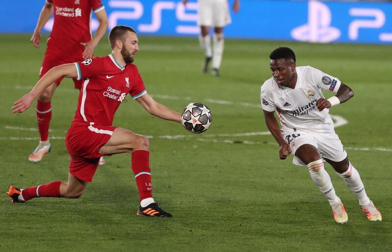 Nathaniel Phillips - 4: The centre back was effective in the air but his flaws were exposed by Real. He was caught in no-man’s land for Vinicius’ opener and was too far away from the Brazilian striker for the third goal. EPA