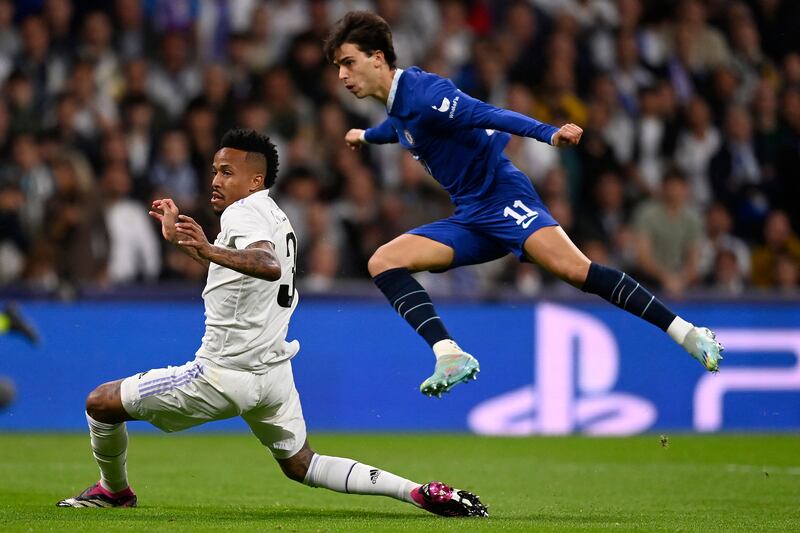 Chelsea forward Joao Felix shoots as Real Madrid's Eder Militao tries to close him down. AFP