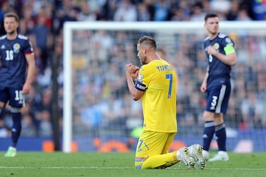 Ukraine's captain Andriy Yarmolenko (C) reacts after scoring the opening goal during the FIFA World Cup 2022 qualification playoff semi final soccer match between Scotland and Ukraine at Hampden Park in Glasgow, Scotland, Britain, 01 June 2022.   EPA / Robert Perry