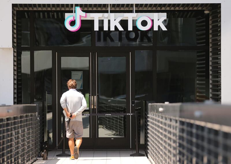 (FILES) In this file photo taken on August 27, 2020, the TikTok logo is displayed in front of a TikTok office on August 27, 2020 in Culver City, California. T US officials on September 18, 2020, ordered a ban on downloads of the popular Chinese-owned mobile applications WeChat and TikTok from September 20, saying they threaten national security. The move comes amid rising US-China tensions over technology and a Trump administration effort to engineer a sale of the video app TikTok to American investors. / AFP / GETTY IMAGES NORTH AMERICA / MARIO TAMA
