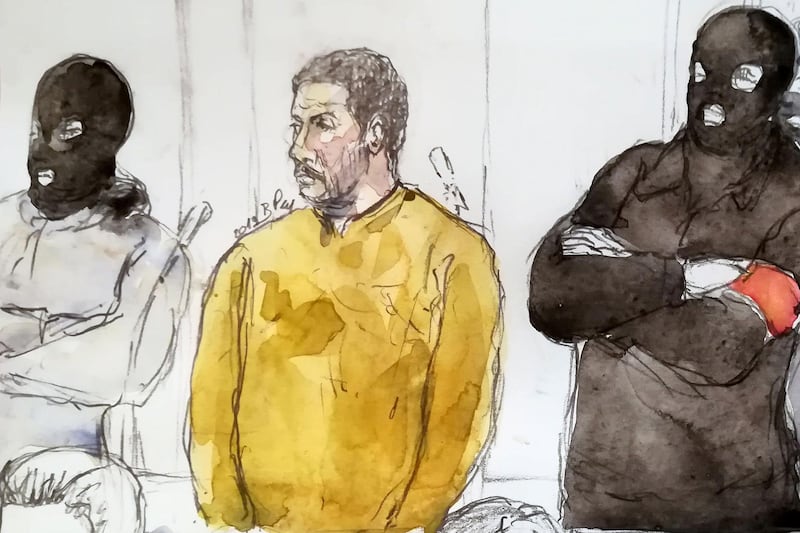 (FILES) A court sketch made on January 10, 2019 shows Mehdi Nemmouche (C), accused of the terrorist attack at the Jewish Museum in Brussels in 2014, during his trial at the Brussels Justice Palace. The court will render its verdict on March 7, 2019 during the trial od Mehdi Nemmouche, 33, who faces a life sentence if convicted of the killings in the Belgian capital on May 24, 2014, following his return from Syria's battlefields.    - 
 / AFP / Benoit PEYRUCQ
