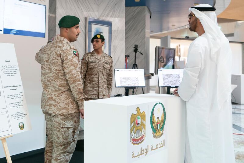 ABU DHABI, UNITED ARAB EMIRATES - April 28, 2019: HH Sheikh Mohamed bin Zayed Al Nahyan, Crown Prince of Abu Dhabi and Deputy Supreme Commander of the UAE Armed Forces (R), attends e-skills exhibition for national service recruits, at Armed Forces Officers Club.
( Rashed Al Mansoori / Ministry of Presidential Affairs )
---