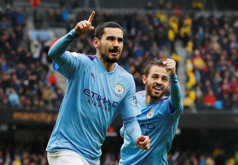 Soccer Football - Premier League - Manchester City v Aston Villa - Etihad Stadium, Manchester, Britain - October 26, 2019  Manchester City's Ilkay Gundogan celebrates scoring their third goal with Bernardo Silva           REUTERS/Phil Noble  EDITORIAL USE ONLY. No use with unauthorized audio, video, data, fixture lists, club/league logos or "live" services. Online in-match use limited to 75 images, no video emulation. No use in betting, games or single club/league/player publications.  Please contact your account representative for further details.