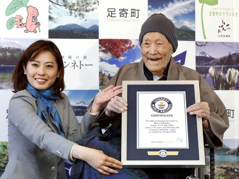 FILE PHOTO: Japanese Masazo Nonaka, who was born 112 years and 259 days ago, receives a Guinness World Records certificate naming him the world's oldest man during a ceremony in Ashoro, on Japan's northern island of Hokkaido, in this photo taken by Kyodo April 10, 2018. Nonaka died at the age of 113 on January 20, 2019, local media reported. Mandatory credit Kyodo/via REUTERS/File Photo ATTENTION EDITORS - THIS IMAGE WAS PROVIDED BY A THIRD PARTY. MANDATORY CREDIT. JAPAN OUT. NO COMMERCIAL OR EDITORIAL SALES IN JAPAN.