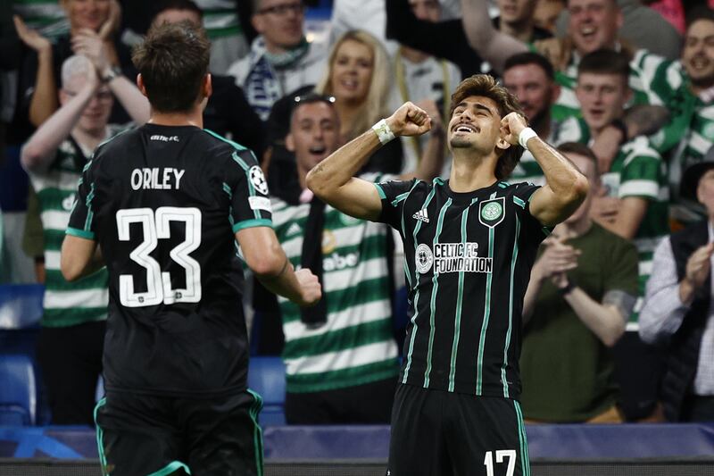 Celtic midfielder Jota celebrates after scoring a fine free-kick. EPA