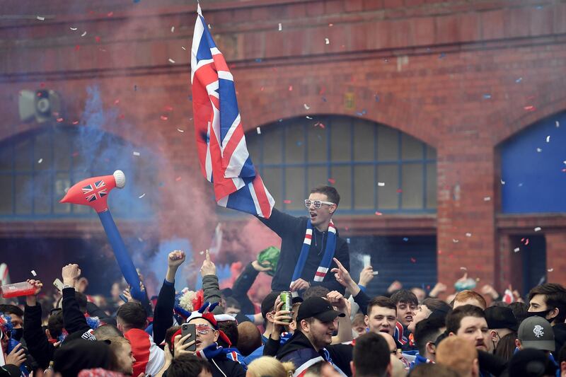 Rangers fans gather at Ibrox stadium to celebrate the club winning the Scottish Premiership for the first time in 10 years. Getty