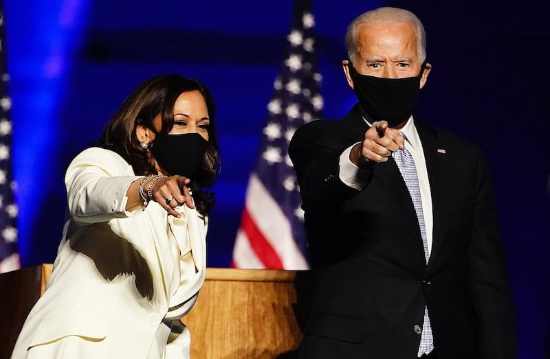 US vice president-elect Kamala Harris and president-elect Joe Biden arrive for victory address after being declared the winner in the 2020 presidential election, in Wilmington, Delaware. EPA
