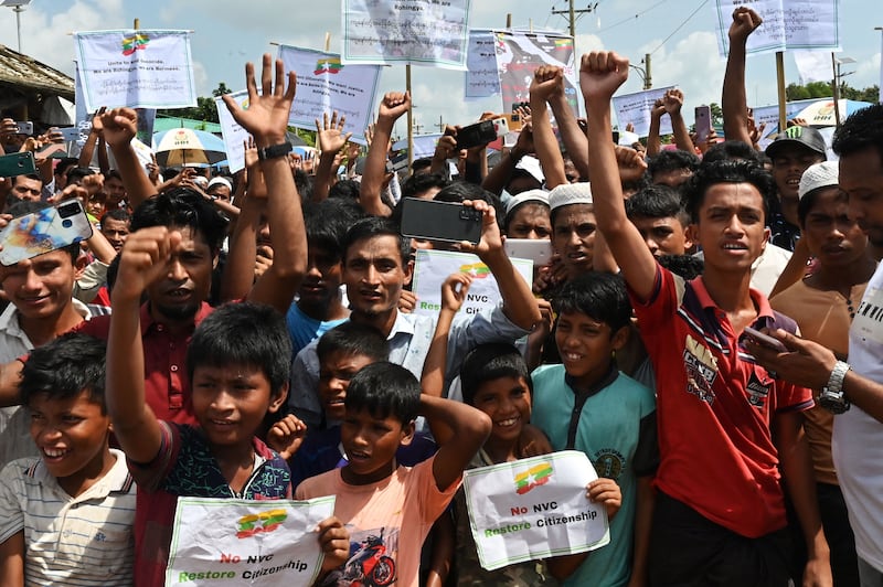 Rohingya refugees at a camp in Ukhia hold a Genocide Remembrance Day rally to mark the fifth anniversary since they fled Myanmar. Thousands of Rohingya held rallies across the network of squalid camps in Bangladesh. AFP