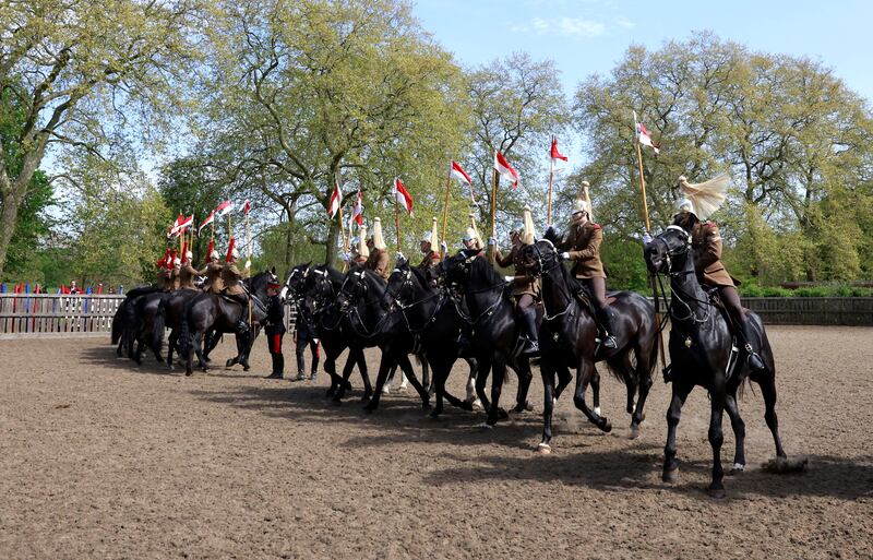 Members of the Household Cavalry during a musical ride rehearsal at Hyde Park in London for the Royal Windsor horse show, as part of the jubilee celebration. Reuters