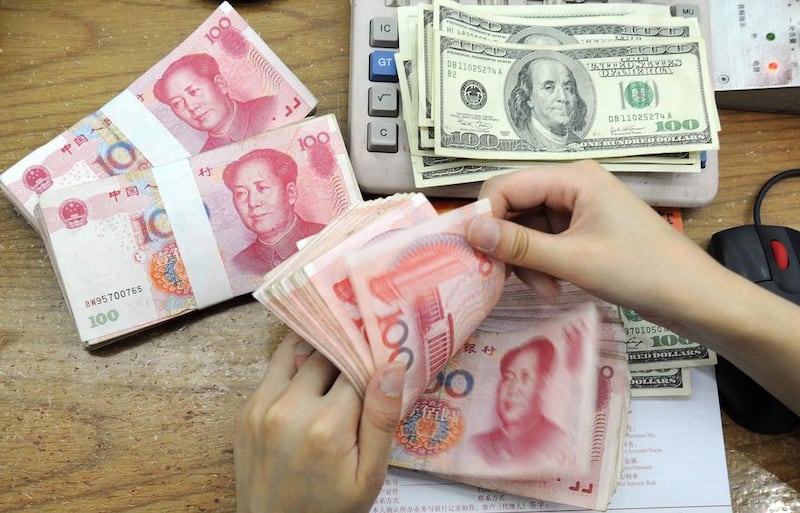 Bank of America Merrill Lynch estimates that the yuan’s 4.4 per cent devaluation this week will lead to oil prices falling by a further 2.2 per cent. AFP