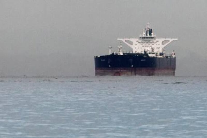 Malta-flagged Iranian crude oil supertanker "Delvar" is seen anchored off Singapore March 1, 2012. Western trade sanctions against Iran are strangling its oil exports even before they go into effect, a U.S. advisory body has found, amid warnings that any shortages will only push up crude prices and strain a weak global economy. REUTERS/Tim Chong (SINGAPORE - Tags: ENERGY BUSINESS MARITIME TRANSPORT)