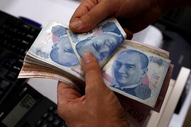 Turkish currency has plummeted to a new record low against the dollar. Reuters