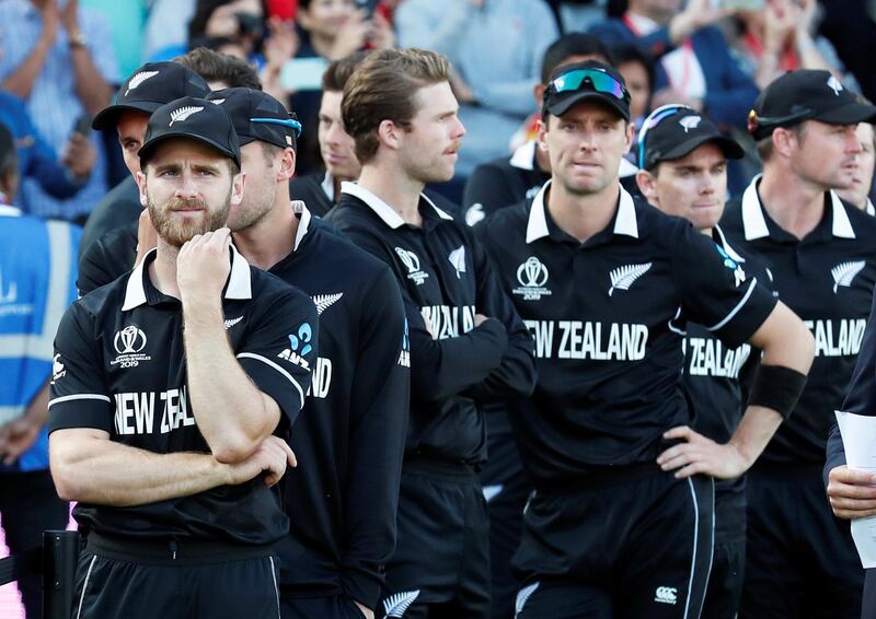 Cricket - ICC Cricket World Cup Final - New Zealand v England - Lord's, London, Britain - July 14, 2019   New Zealand's Kane Williamson and teammates looks dejected as they await their runners up medals   Action Images via Reuters/Peter Cziborra