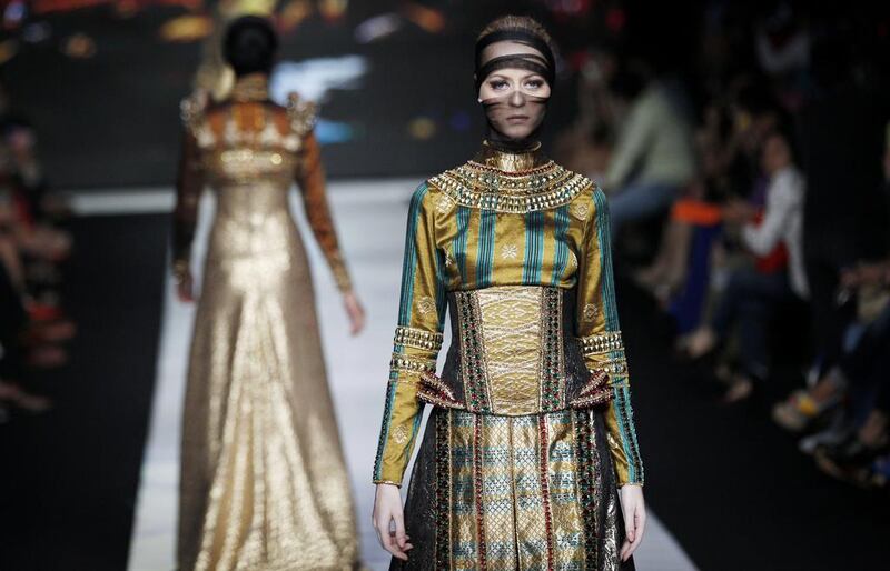 A model shows a creation by Indonesian designer Fomalhaut Zamel during the Jakarta Fashion Week in Jakarta, Indonesia. Achmad Ibrahim / AP Photo