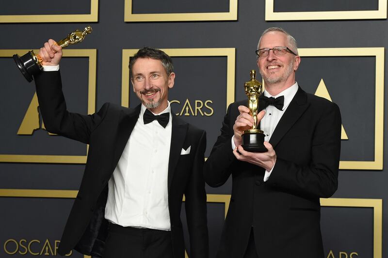 Stuart Wilson, left, and Mark Taylor, winners of the award for best sound mixing for '1917' at the  at the 92nd Academy Awards on Sunday, February 9. AP