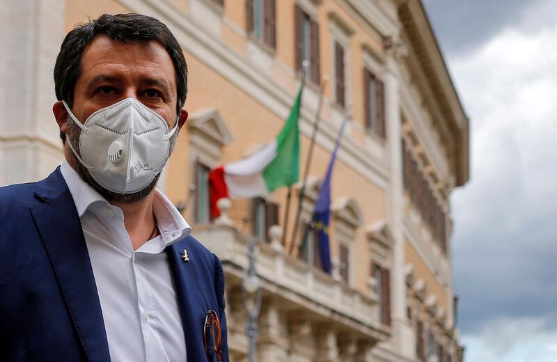 epa08379742 The leader of Lega party, Matteo Salvini wears a protective mask during an interview in piazza Montecitorio next to the Chamber of Deputies, Rome, Italy, 23 April 2020. Countries around the world are taking increased measures to stem the widespread of the SARS-CoV-2 coronavirus which causes the COVID-19 disease.  EPA/RICCARDO ANTIMIANI