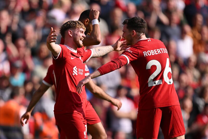 Andrew Robertson of Liverpool celebrates scoring his team's second goal with teammate Harvey Elliott. Getty Images