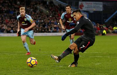 Soccer Football - Premier League - Burnley vs Arsenal - Turf Moor, Burnley, Britain - November 26, 2017   Arsenal's Alexis Sanchez scores their first goal from the penalty spot    REUTERS/Andrew Yates    EDITORIAL USE ONLY. No use with unauthorized audio, video, data, fixture lists, club/league logos or "live" services. Online in-match use limited to 75 images, no video emulation. No use in betting, games or single club/league/player publications. Please contact your account representative for further details.