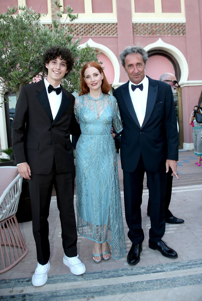 Jessica Chastain, centre, wore an ice blue embellished Elie Saab gown for a screening of 'The Hand Of God' at the 78th Venice International Film Festival. Getty Images