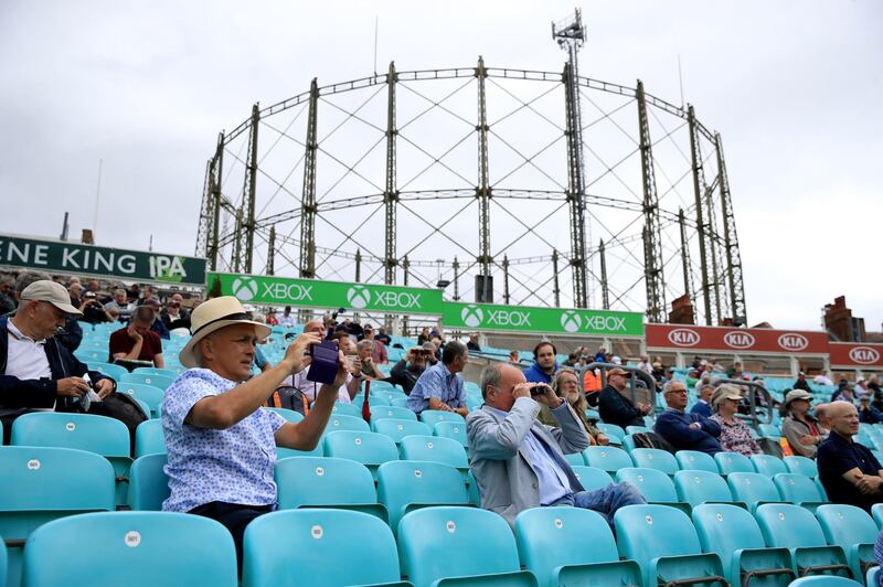 Fans watching the action at The Oval. PA