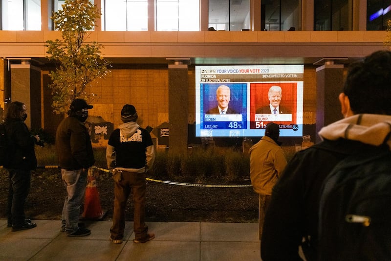 Florida election results are displayed on a screen in Black Lives Matter Plaza during the 2020 Presidential election in Washington, DC. Bloomberg