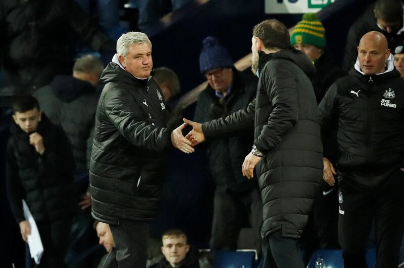 Newcastle United manager Steve Bruce shakes hands with West Bromwich Albion manager Slaven Bilic at the end of the match. Newcastle won 3-2 to advance to the FA Cup quarter-finals. Reuters