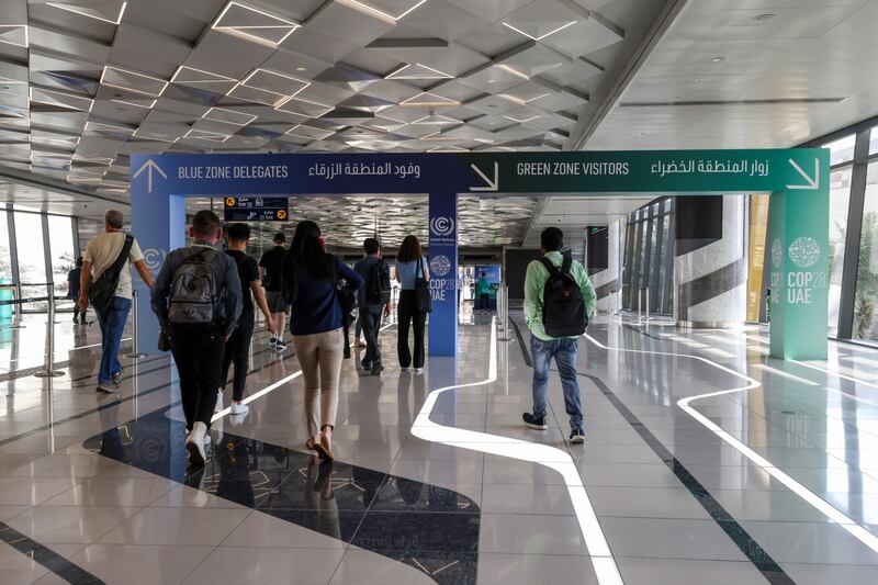 Participants enter the Blue and Green zones ahead of the Cop28 climate conference at Expo City. Bloomberg