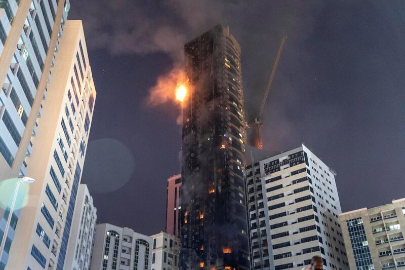 SHARJAH, UNITED ARAB EMIRATES. 05 MAY 2020. STANDALONE. Fire at the Abbco Tower near Nahda Park in Sharjah. Police and fire fighters responded to a blaze that was reported after 8:30. (Photo: Antonie Robertson/The National) Journalist: Salam Al Amir. Section: National.