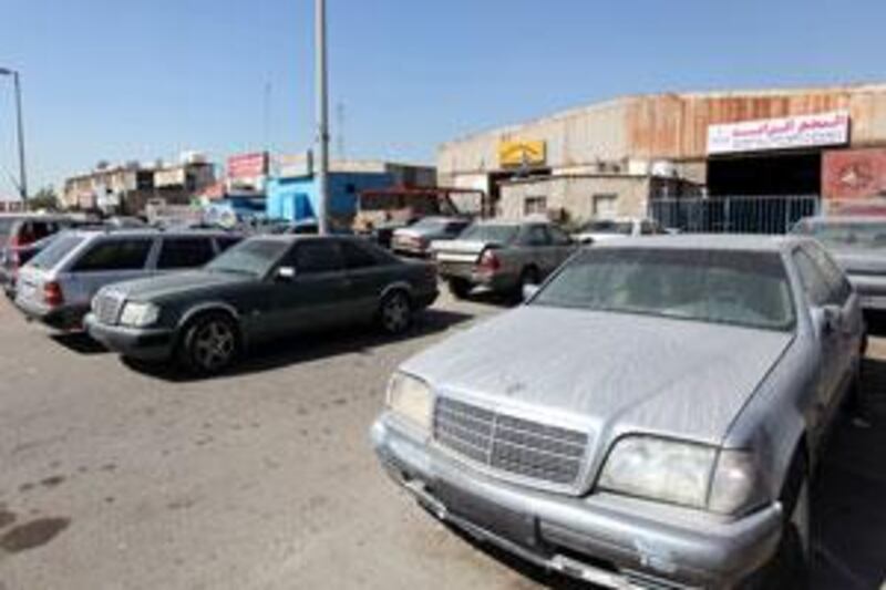 Abandoned cars in Musaffah line the streets. A reader advocates the elimination of old cars in order to reduce congestion and improve air quality.