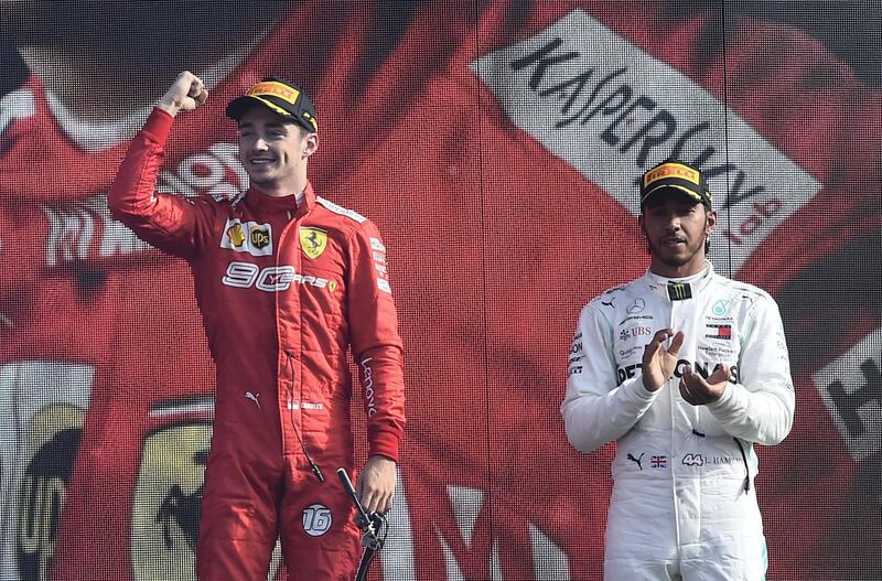 Formula One F1 - Italian Grand Prix - Circuit of Monza, Monza, Italy - September 8, 2019   Ferrari's Charles Leclerc celebrates winning the race with third place Mercedes' Lewis Hamilton     REUTERS/Massimo Pinca