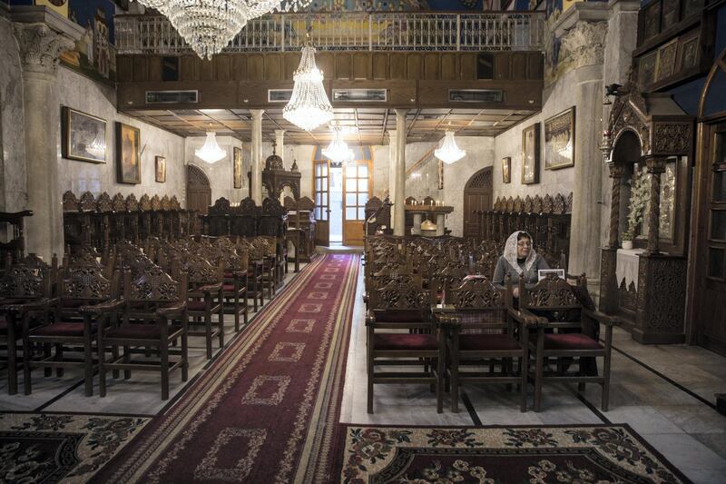 A member of Gaza's Greek Orthodox Christian community arrives early for Sunday mass at the  Church of Saint Porphyrius in Gaza City on December 23,2018. The church dates to 12th-century.(Photo by Heidi Levine for The National).