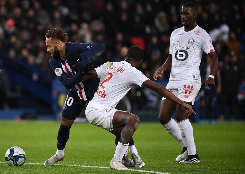 Neymar battles with Lille's Portuguese defender Tiago Djalo. AFP