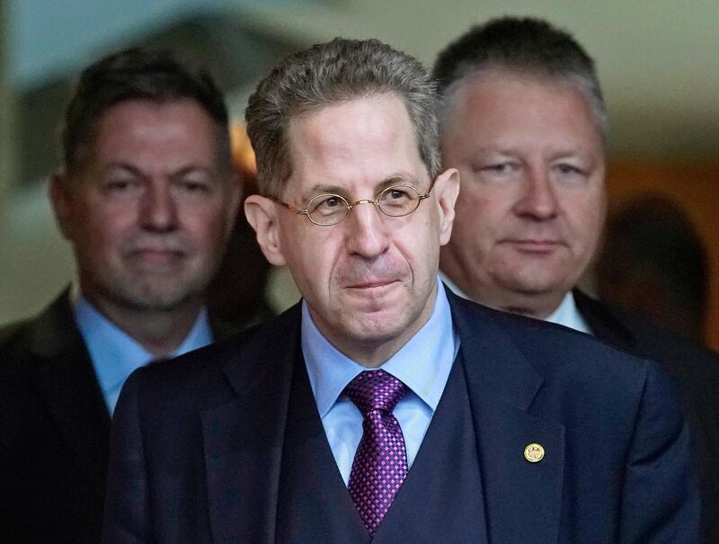 epa07030191 (FILE) - The Presidents of the Federal Office for the Protection of the Constitution, Hans-Georg Maassen (C), of the Federal Intelligence Service (Bundesnachrichtendienst, BND), Bruno Kahl (R) and of the Military Counterintelligence Service, (Militaerischer Abschirmdienst, MAD), Christof Gramm (L) arrive for the first public hearing of the three German intelligence agencies by a parliamentary control committee, in Berlin, Germany, 05 October 2017 (reissued 18 September 2018). German media reports on 18 September 2018 state the German domestic intelligence chief Maassen gets shifted from his post to serve as state secretary in the Interior Ministry. The move comes following a meeting of the heads of the ruling coalition parties on the controversy surrounding comments he made in Bild newspaper he was sceptical of far-right extremists having 'hunted' migrants and foreign-looking people at recent protests in eastern German city of Chemnitz, and that he had 'good reasons' to believe a video showing those scenes was antifascist propaganda.  EPA/FELIPE TRUEBA *** Local Caption *** 53810766