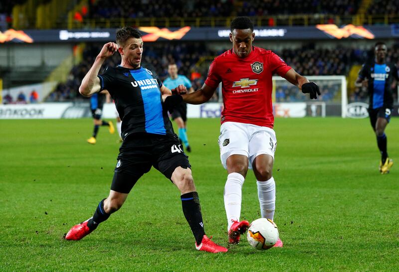 Soccer Football - Europa League - Round of 32 First Leg - Club Brugge v Manchester United - Jan Breydel Stadium, Bruges, Belgium - February 20, 2020  Manchester United's Anthony Martial in action with Club Brugge's Brandon Mechele   REUTERS/Francois Lenoir