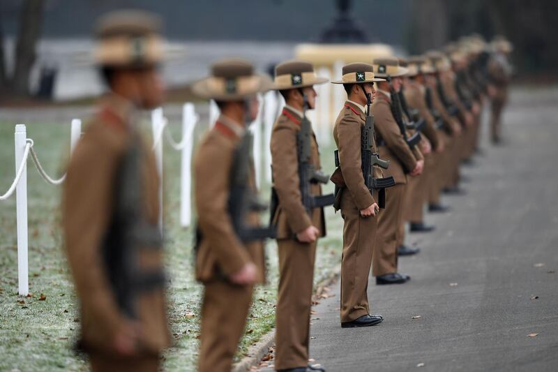 Nepalese Gurkha soldiers line the route.  AFP