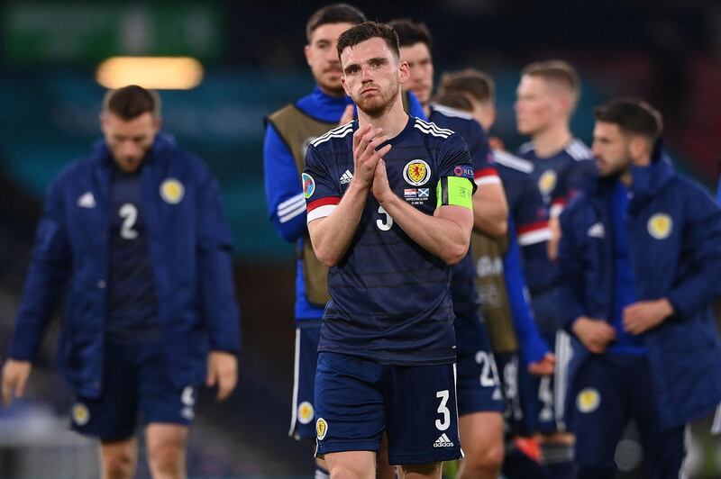 Scotland's defender Andrew Robertson (C) greets the crowd after their defeat in the UEFA EURO 2020 Group D football match between Croatia and Scotland at Hampden Park in Glasgow on June 22, 2021. / AFP / POOL / Stu Forster
