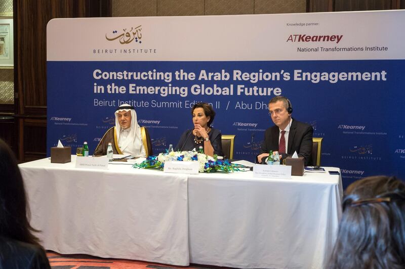 ABU DHABI, UNITED ARAB EMIRATES - Prince Turki bin Faisal Al Saud , Raghida Dergham and Rudolph Lohmeyer, Vice President, Global Business Policy Council, A.T. Kearney at the press conference of Constructing the Arab Region's Engagement in the Emerging Global Future, Beirut Instute Summit Edition ll at St. Regis Hotel, corniche Abu Dhabi.  Leslie Pableo for The National for Mina Aldroubi's story