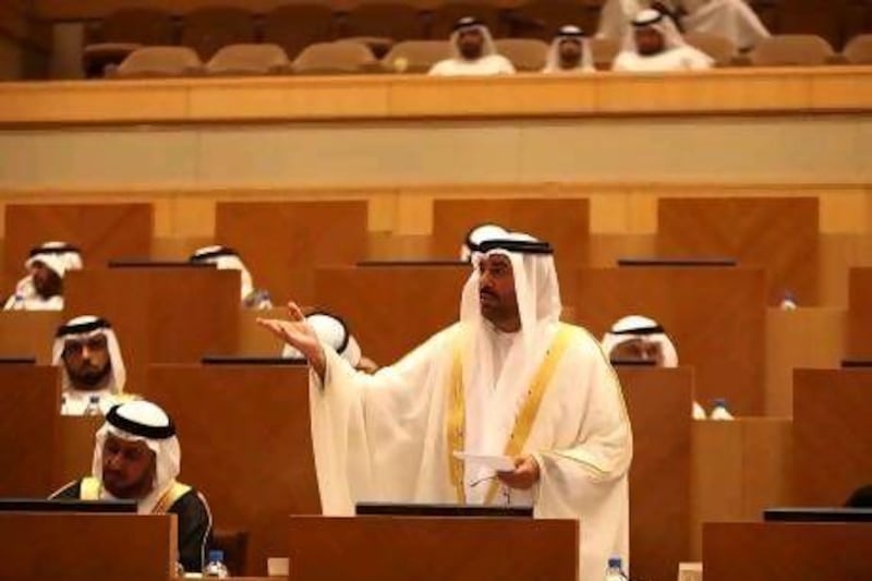The FNC member Ahmed Al Shamsi, above, asks questions about utilities in the Northern Emirates.