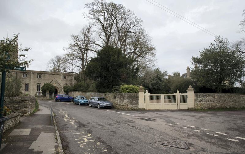 WOOTTON, OXFORDSHIRE, UK. 5th April 2019. Exterior of Wootton Place the estate of businessman Arif Naqvi (right) next to the village church (left) in the village of Wootton, United Kingdom,  Stephen Lock for the National . Words: Paul Peachey. 