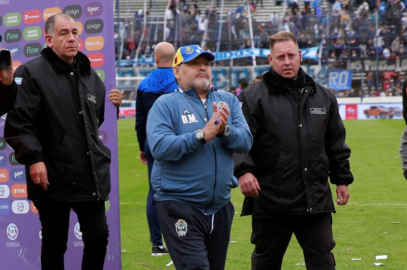 epa07937573 Gimnasia y Esgrima's head coach Diego Maradona gestures to fans after the defeat of his team during a match between Gimnasia y Esgrima and Union for the Argentine soccer Super League, at the Juan Carmelo Zerillo stadium in La Plata, Buenos Aires, Argentina, 20 October 2019.  EPA/Demian Alday EstÃ©vez