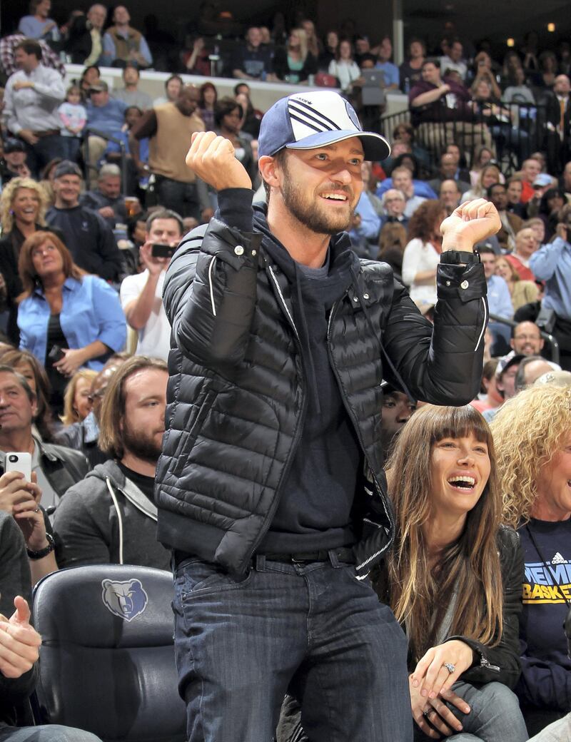 MEMPHIS, TN - NOVEMBER 23: Recording artist and Memphis Grizzlies minority owner Justin Timberlake dances along side Jessica Biel during a game between the Memphis Grizzlies and the Los Angeles Lakers on November 23, 2012 at FedExForum in Memphis, Tennessee. NOTE TO USER: User expressly acknowledges and agrees that, by downloading and or using this photograph, User is consenting to the terms and conditions of the Getty Images License Agreement. Mandatory Copyright Notice: Copyright 2012 NBAE   Joe Murphy/NBAE via Getty Images/AFP