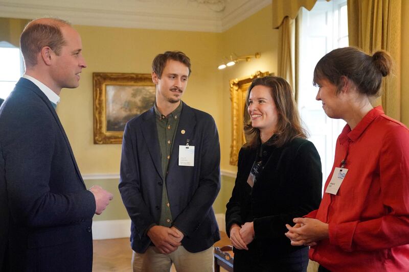 The Prince of Wales speaks to some of the Earthshot Prize finalists. AFP